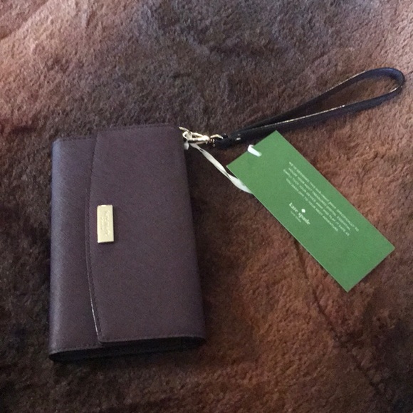 kate spade Handbags - NWT Kate Spade Laurel Way iPhone 7/8 Wristlet